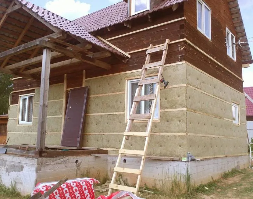 Приклад утеплення стін під обшивку сайдингом