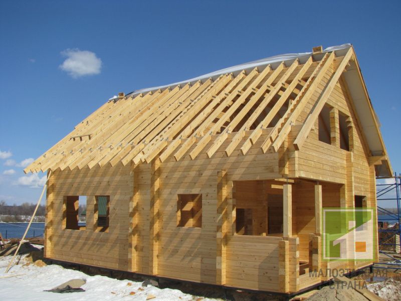 Будівництво будинку з бруса: види будівельного бруса, особливості проектування, етапи будівництва