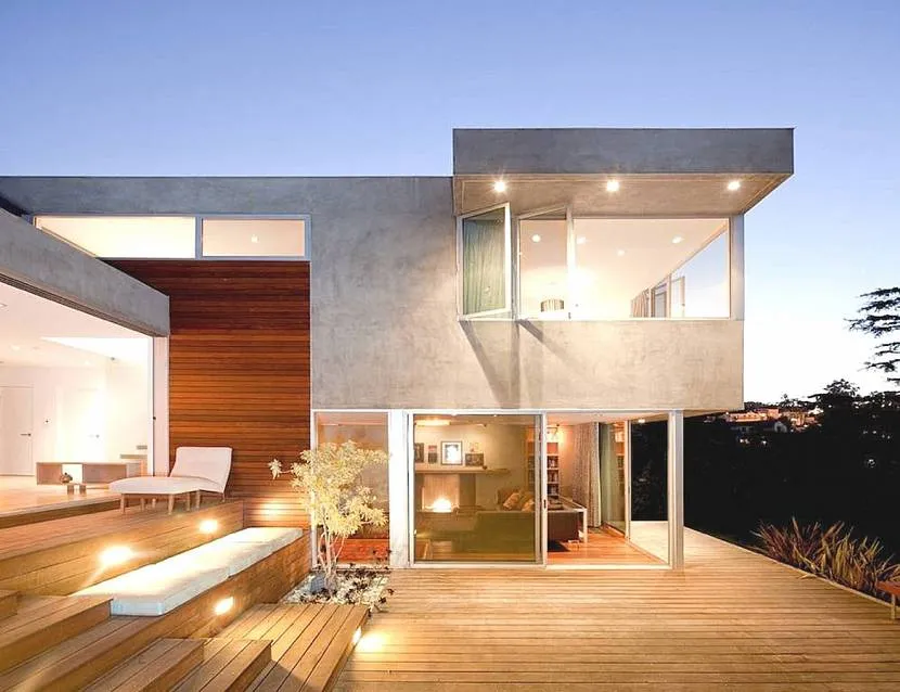 Dom z fasadami betonowo-szklanymi