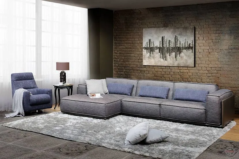 Modułowa sofa we wnętrzu salonu w stylu loft