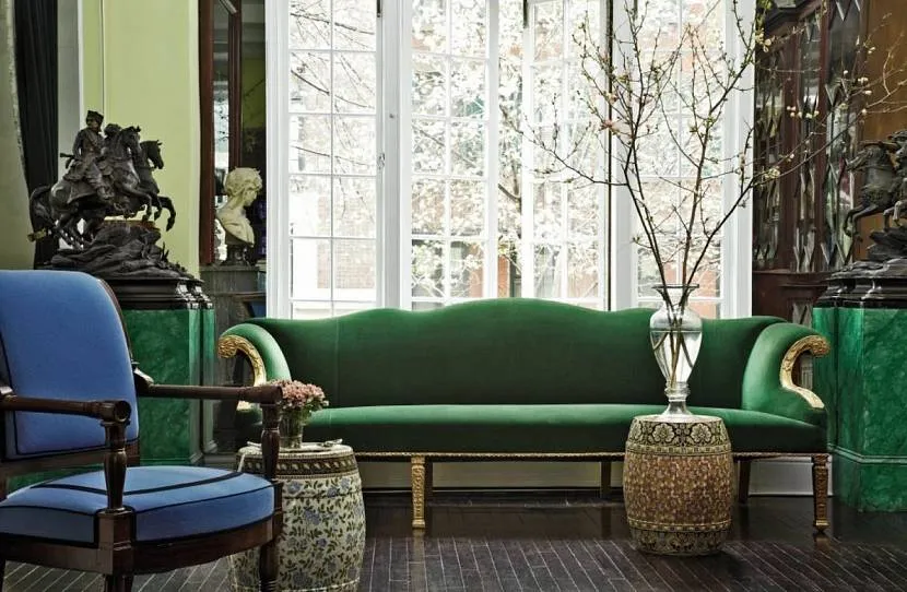 Ciemnozielona sofa