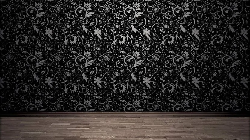 Czarna tapeta ze srebrnymi ornamentami do przestronnych salonów